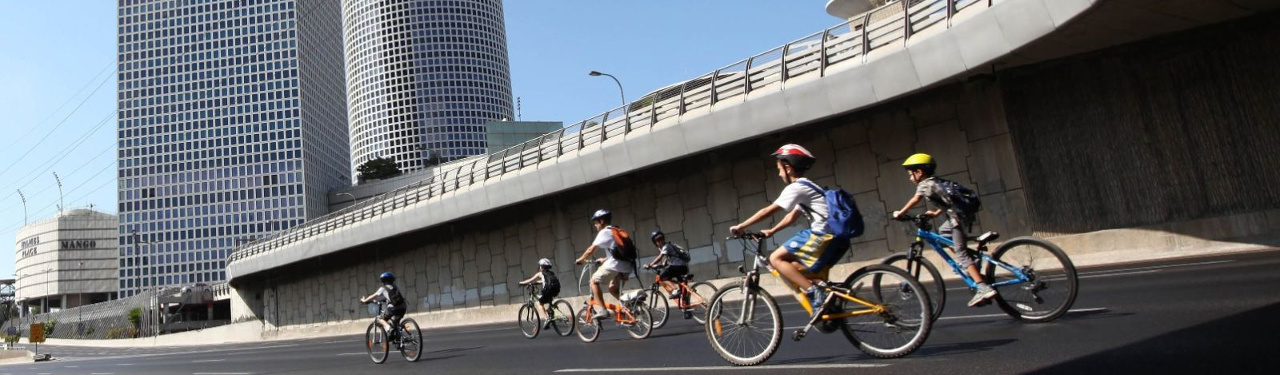 Cyclists on the Ayalon highway